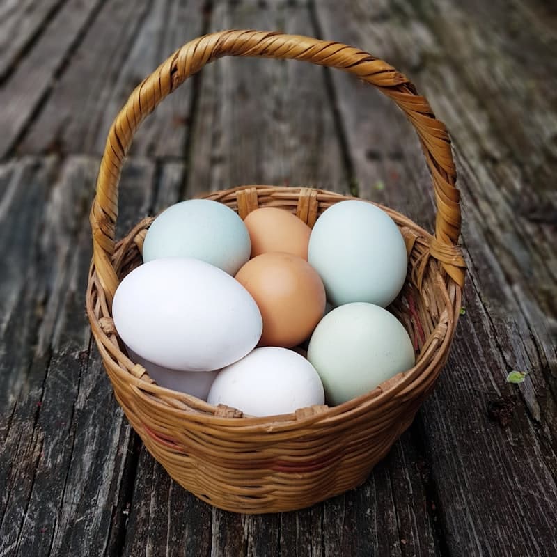 A basket of brown and white eggs